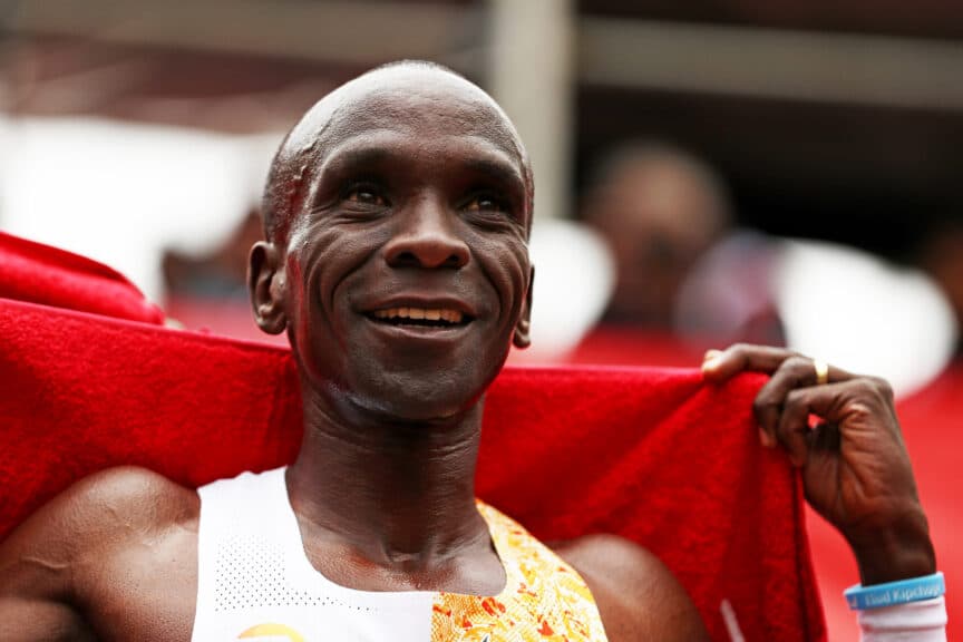 Eliud Kipchoge of Kenya celebrates after he crosses the line