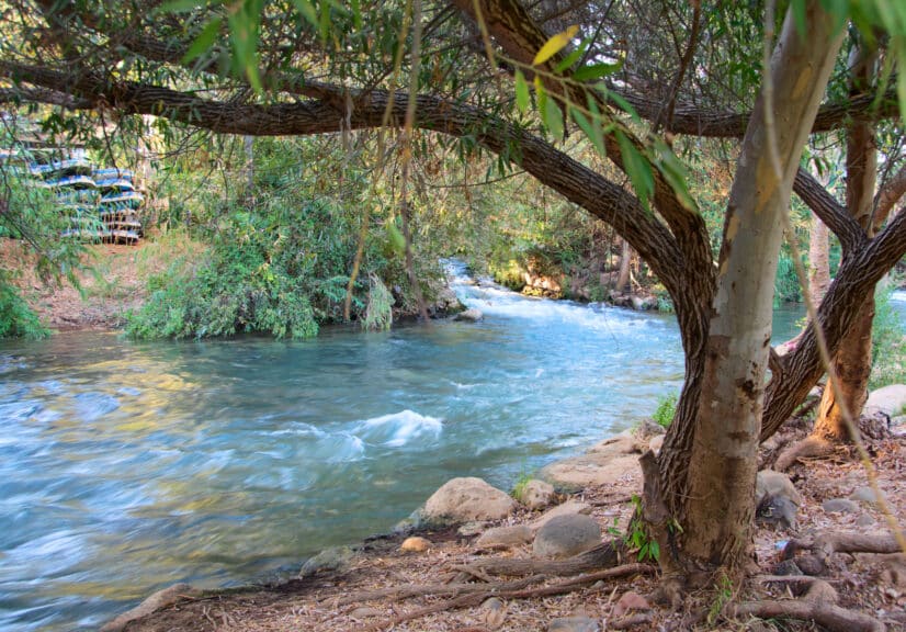 Flowing-stream-of-the-Jordan-River-in-Israel