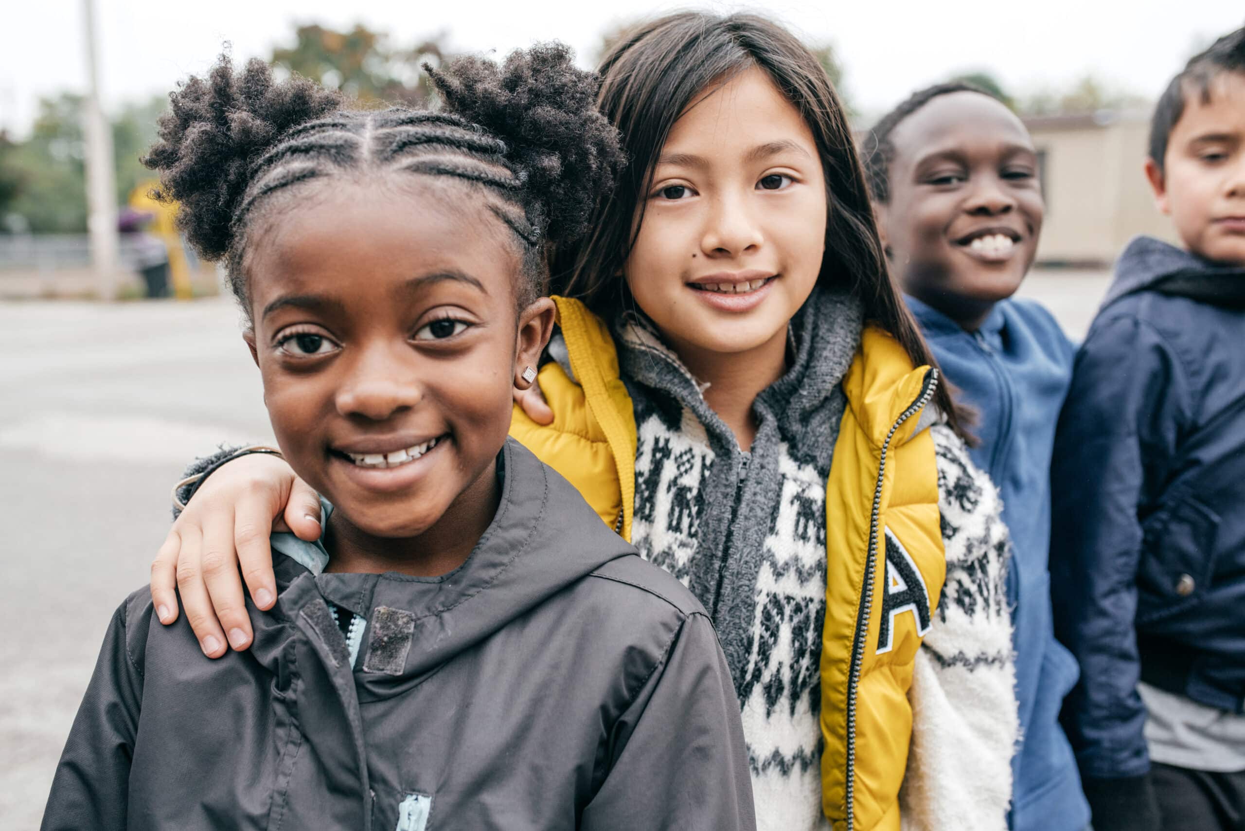 kids standing outside on playground
