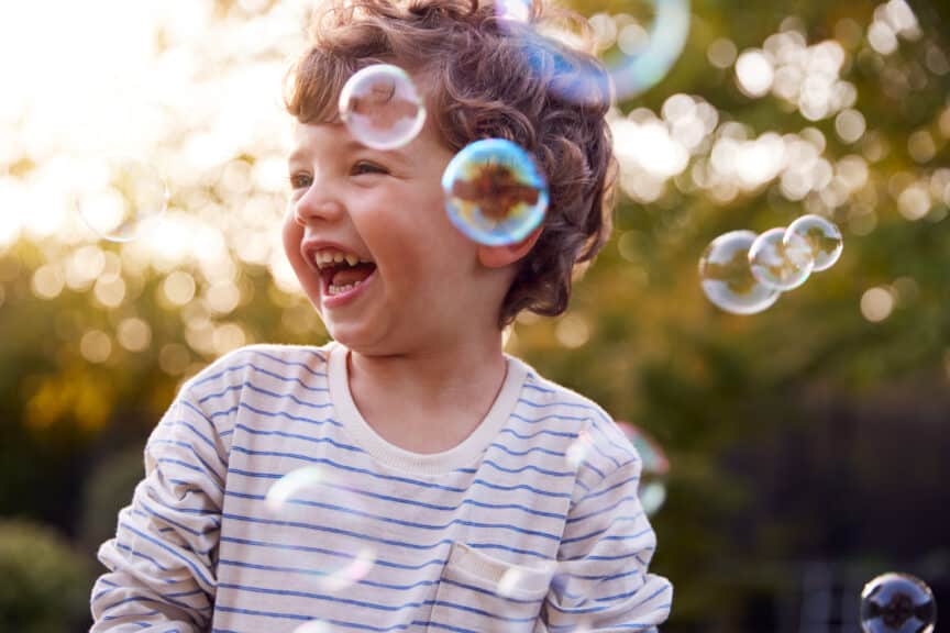 small boy with bubbles