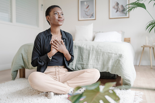 woman sitting in gratitude