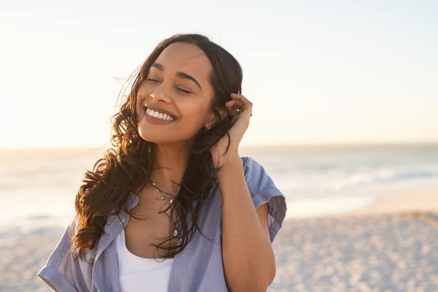 Woman smiling on beach