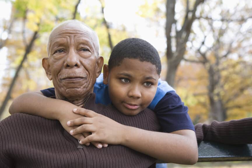 Grandson hugging grandfather