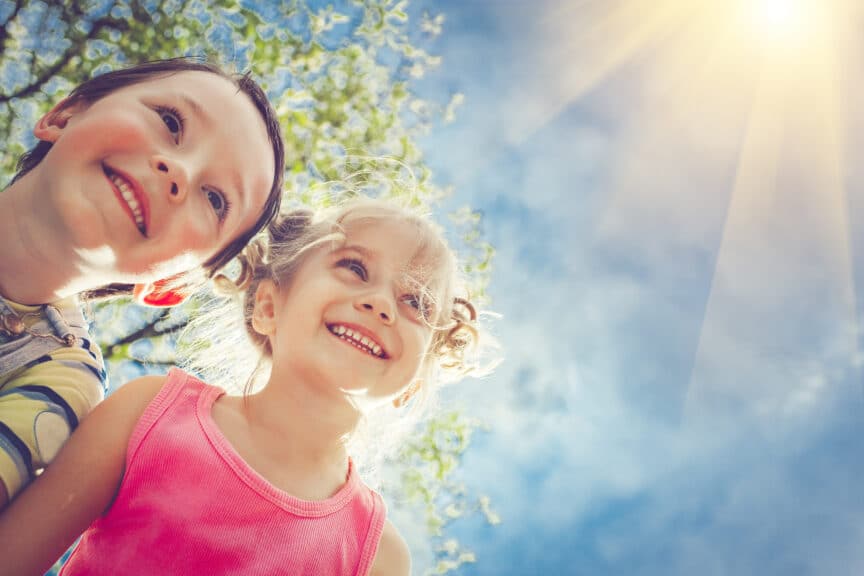 two happy children in summer