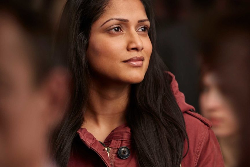 Portrait of beautiful woman in crowd