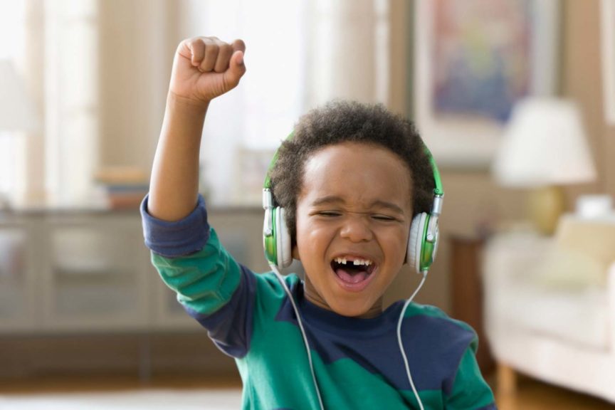 boy-listening-to-music-headphones