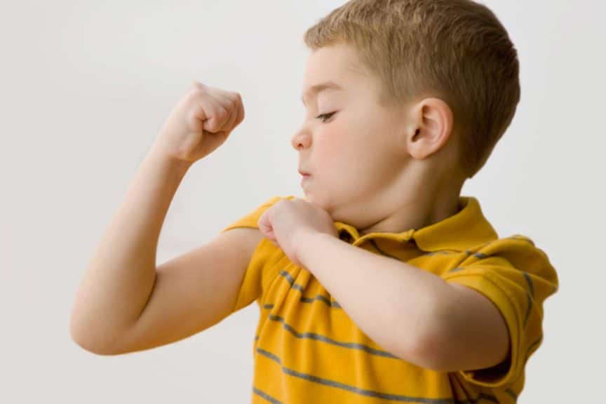 boy flexing biceps