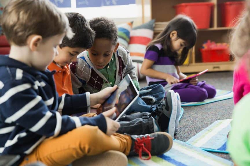 boys-using-tablet-elementary-school