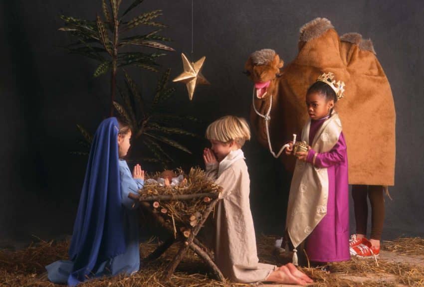 Diverse children acting in nativity scene