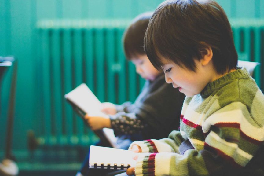 children-church-singing-book