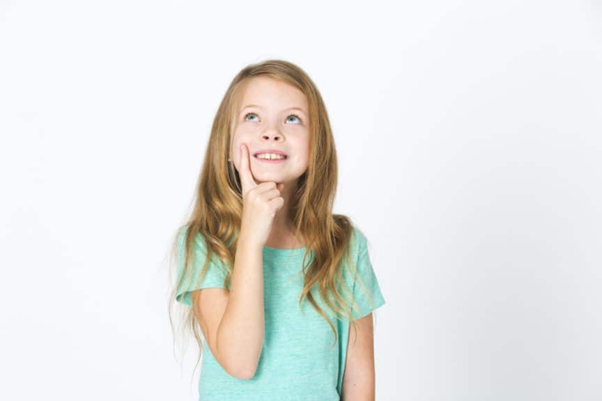 Cute Thoughtful Girl With Long Hair Standing Against White Background