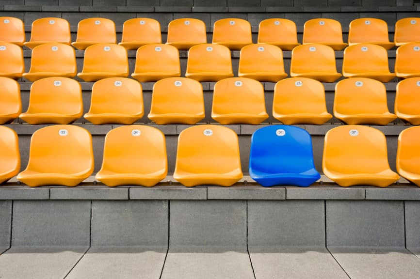 Empty stadium seats orange and blue