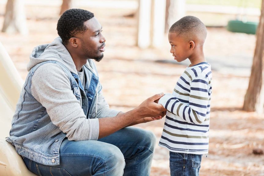 father talks with son