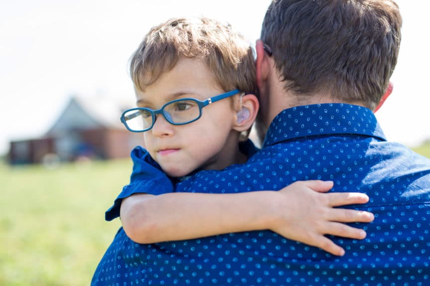 Father And Son Hugging On Outdoor summer