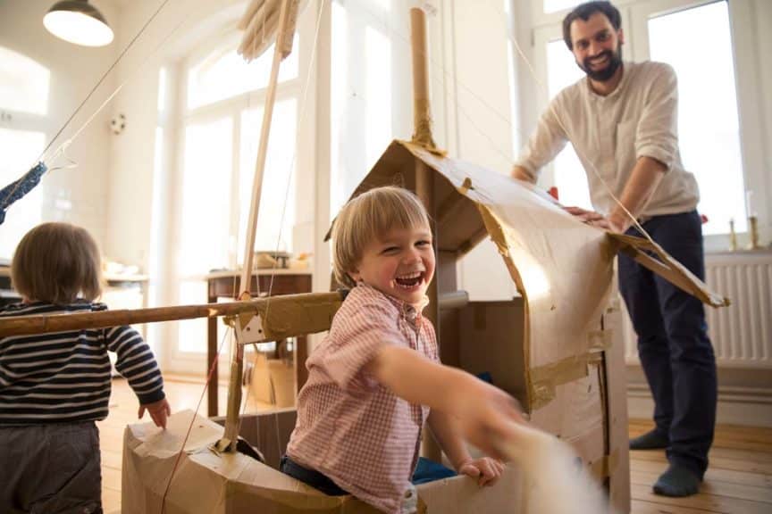 father-son-playing-boat