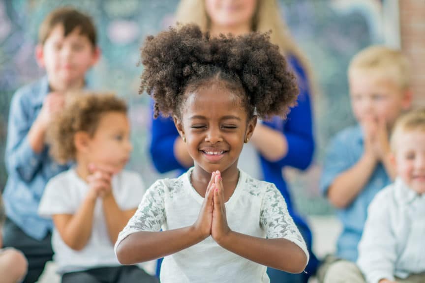 girl learning to pray sunday school