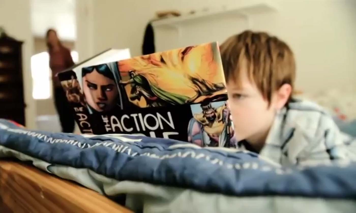 boy reading The Action Bible
