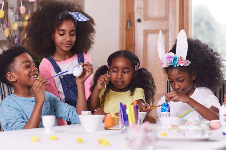 kids decorating easter eggs craft