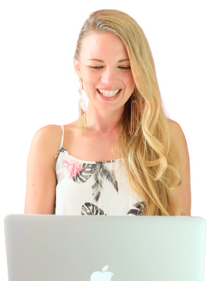 Smiling woman working at a laptop