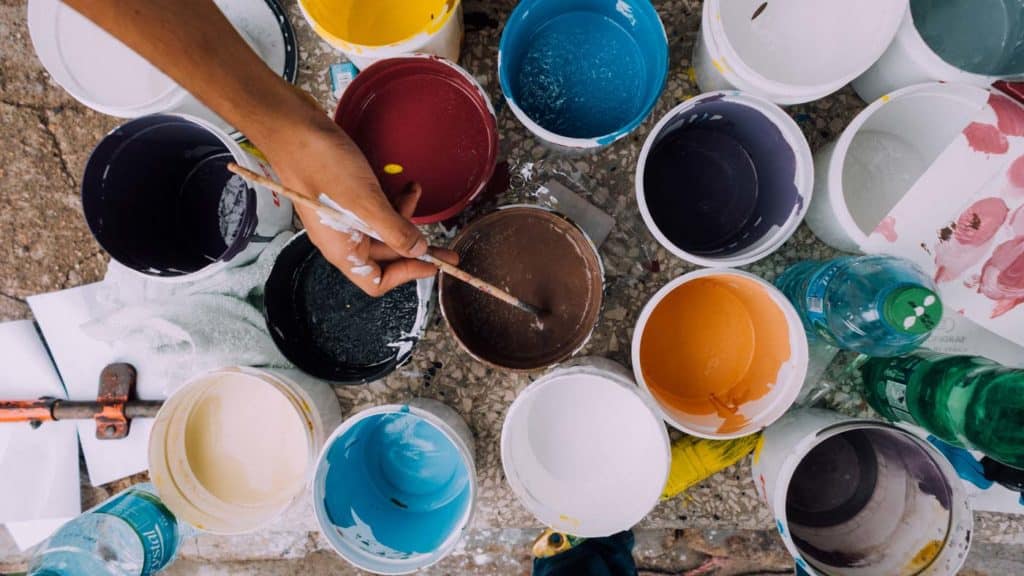 painting-hand-brush-paint-buckets