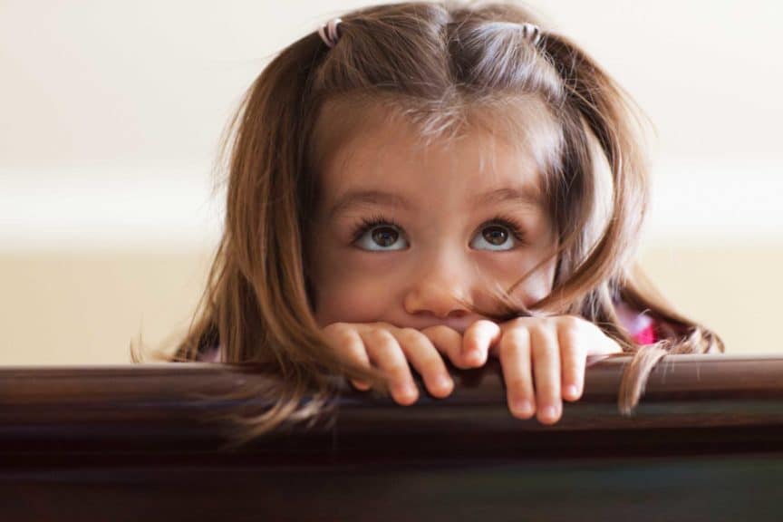 shy worried girl looking up