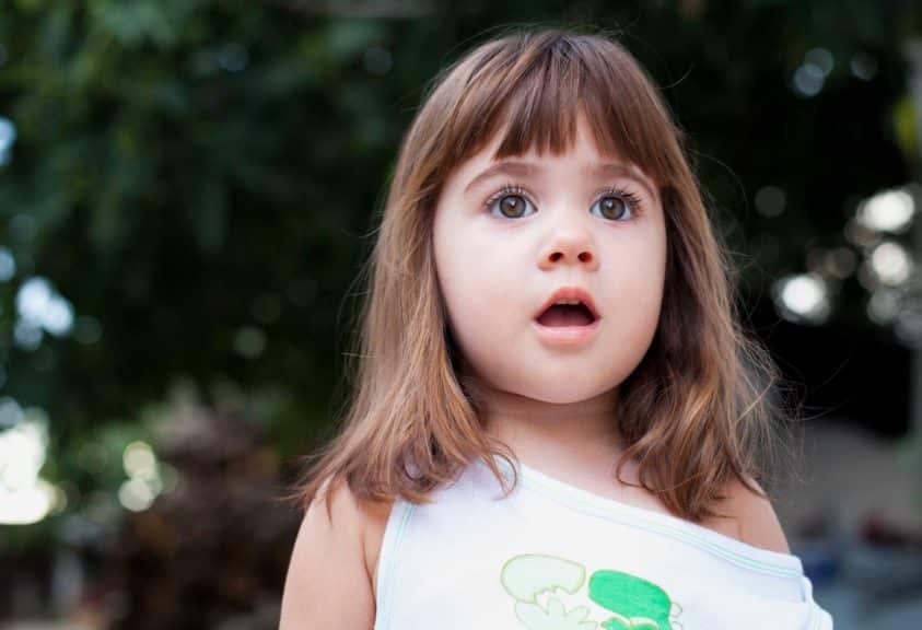 small-girl-surprized-outside-brown-hair